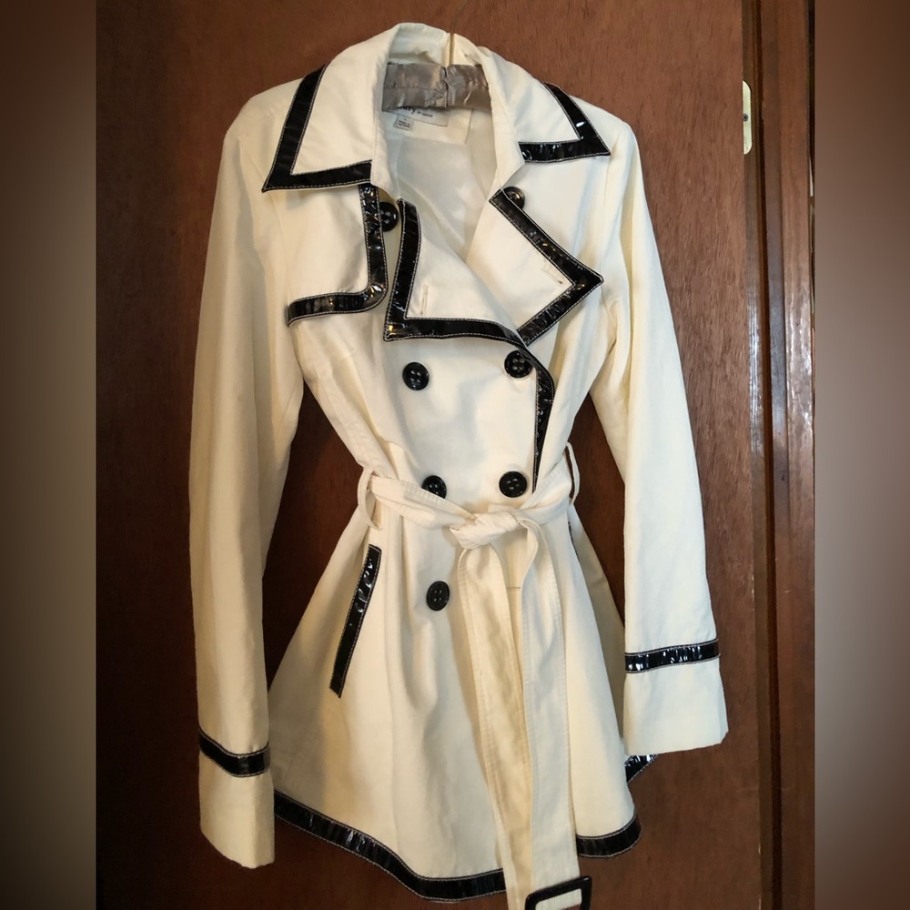 Laundry size L rain jacket. White with black pattern leather trim.